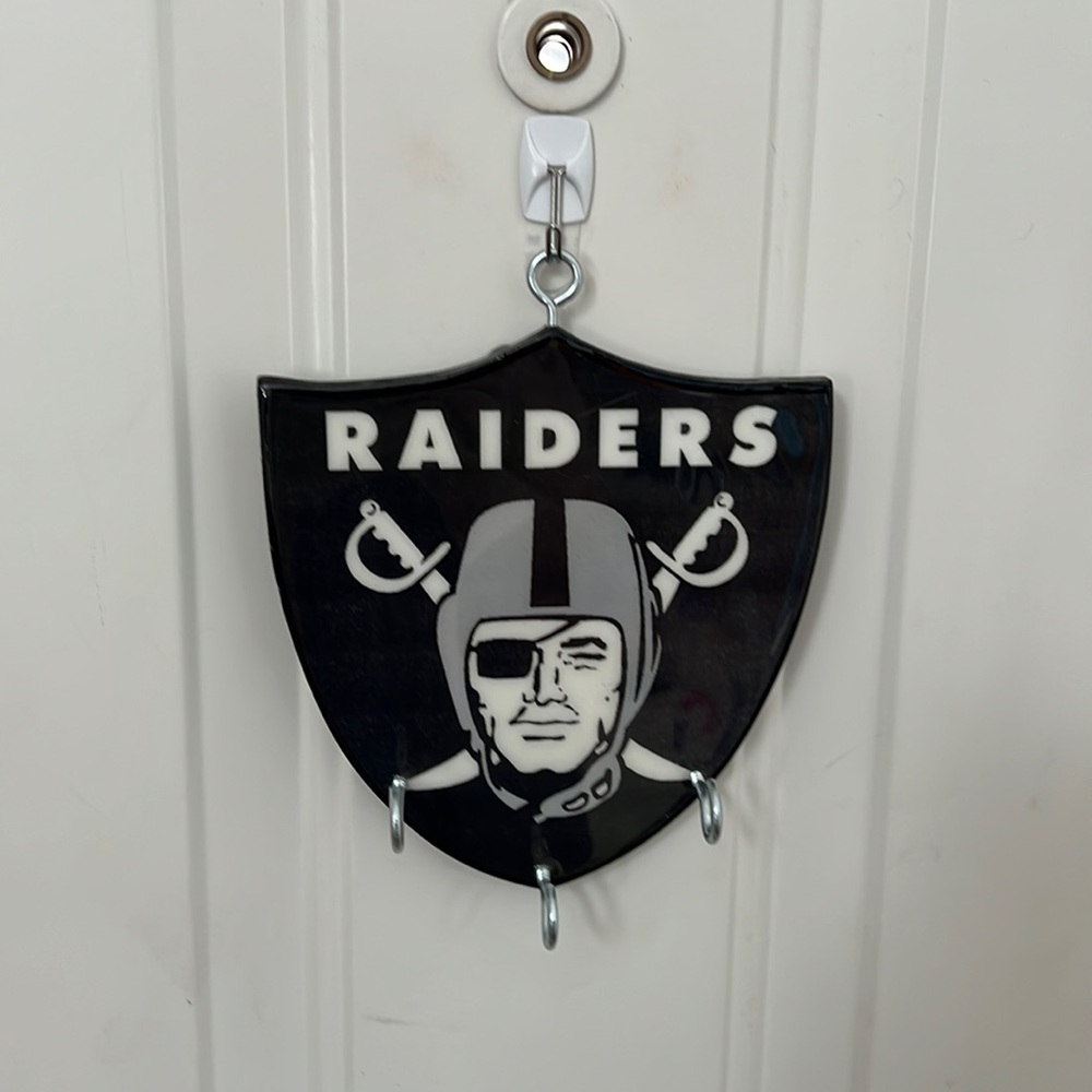 Raider key keeper plaque